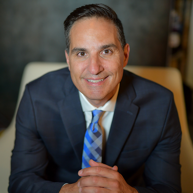 Photograph of Dream Town agent Louie Kritikos